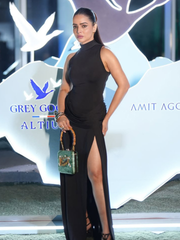 Kaniz Sayed Wearing Ginza Tiger Clutch Green Satin Minaudière