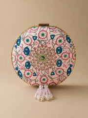 Kamal Bagh Embroidered Clutch, round pink clutch with a lotus mandala embroidery in pink and blue and beaded pearl tassels, front view