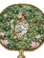 Close-up of the Mughal E Taj Embroidered Clutch's miniature portrait of a nobleman in jeweled robes, set against a green scalloped ground with gold sequins and lotus flowers.