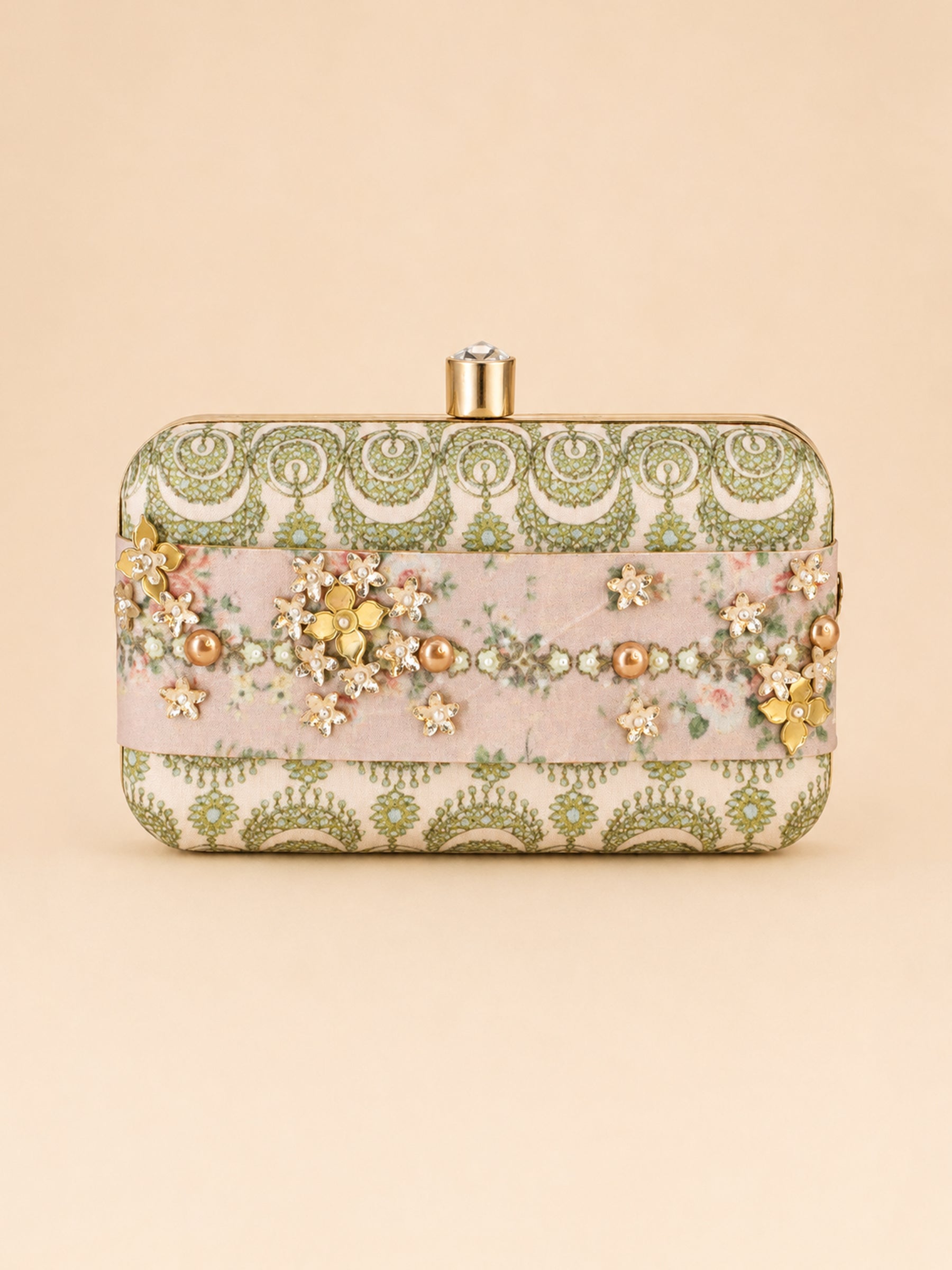 Front view of the Garden of Jewels Clasp Clutch, a rectangular box clutch with green paisley-patterned fabric panels, a pink floral center band embellished with pearl and crystal flower clusters, and a gold clasp with a crystal stone.