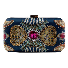 JANINA GAVANKAR | American Actress Wearing Ultramarine Royale Clutch Bag