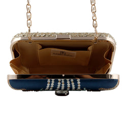 JANINA GAVANKAR | American Actress Wearing Ultramarine Royale Clutch Bag