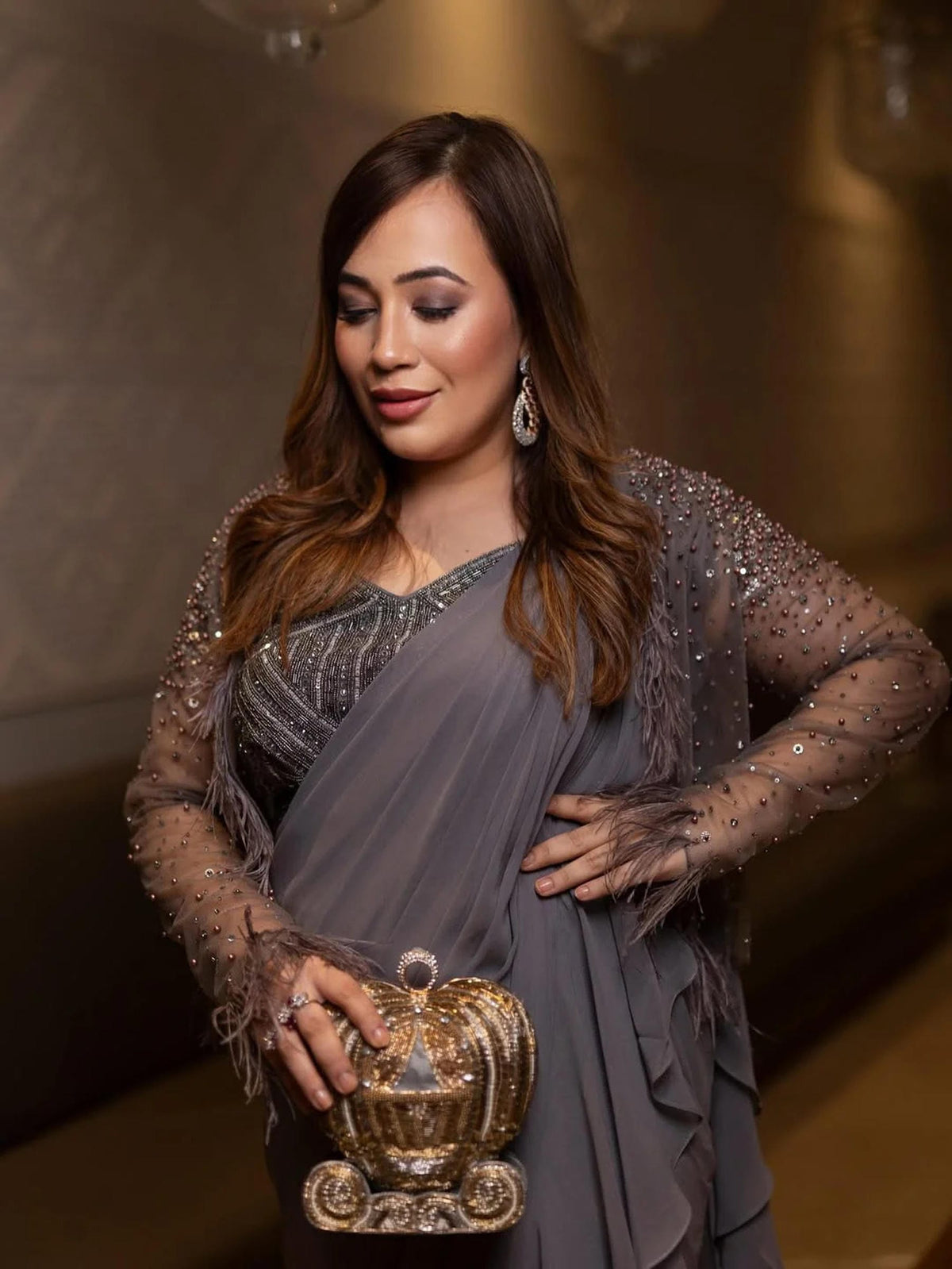 RISHIKA KHERA Wearing Gold Beaded Minaudière