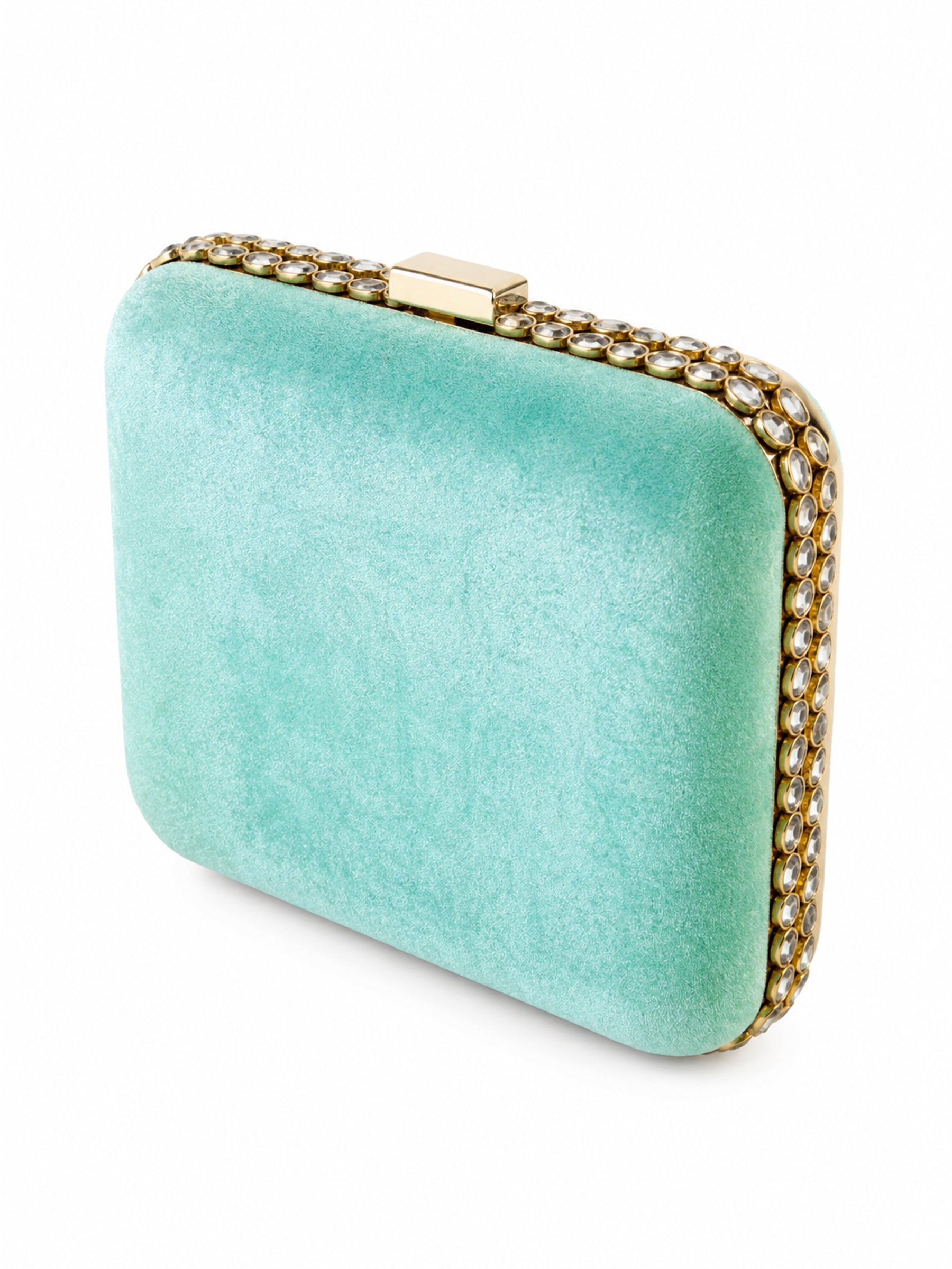 Three-quarter angled view of the Saheliya Embroidered Clutch in turquoise velvet with a crystal-studded gold border and gold clasp.