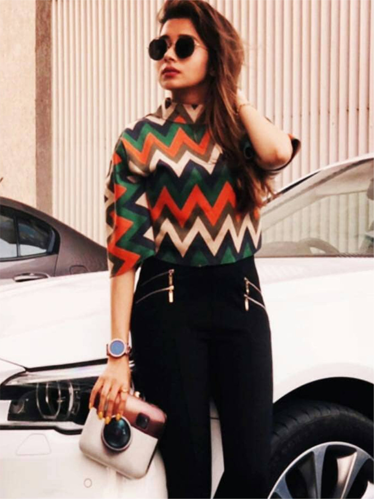 TINA DUTTA Wearing Instagram Clutch